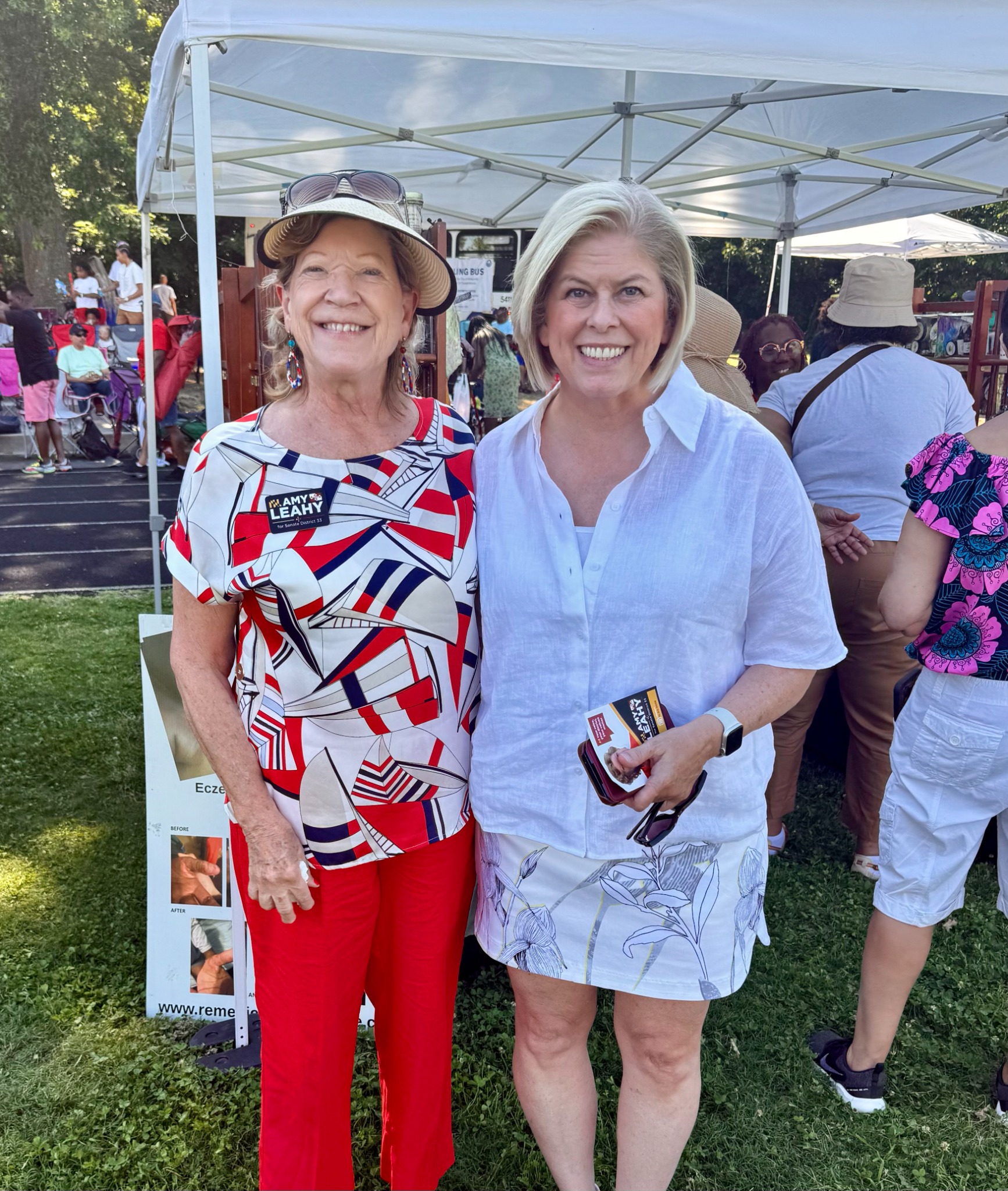 Amy Leahy with Laura Neuman at a community event