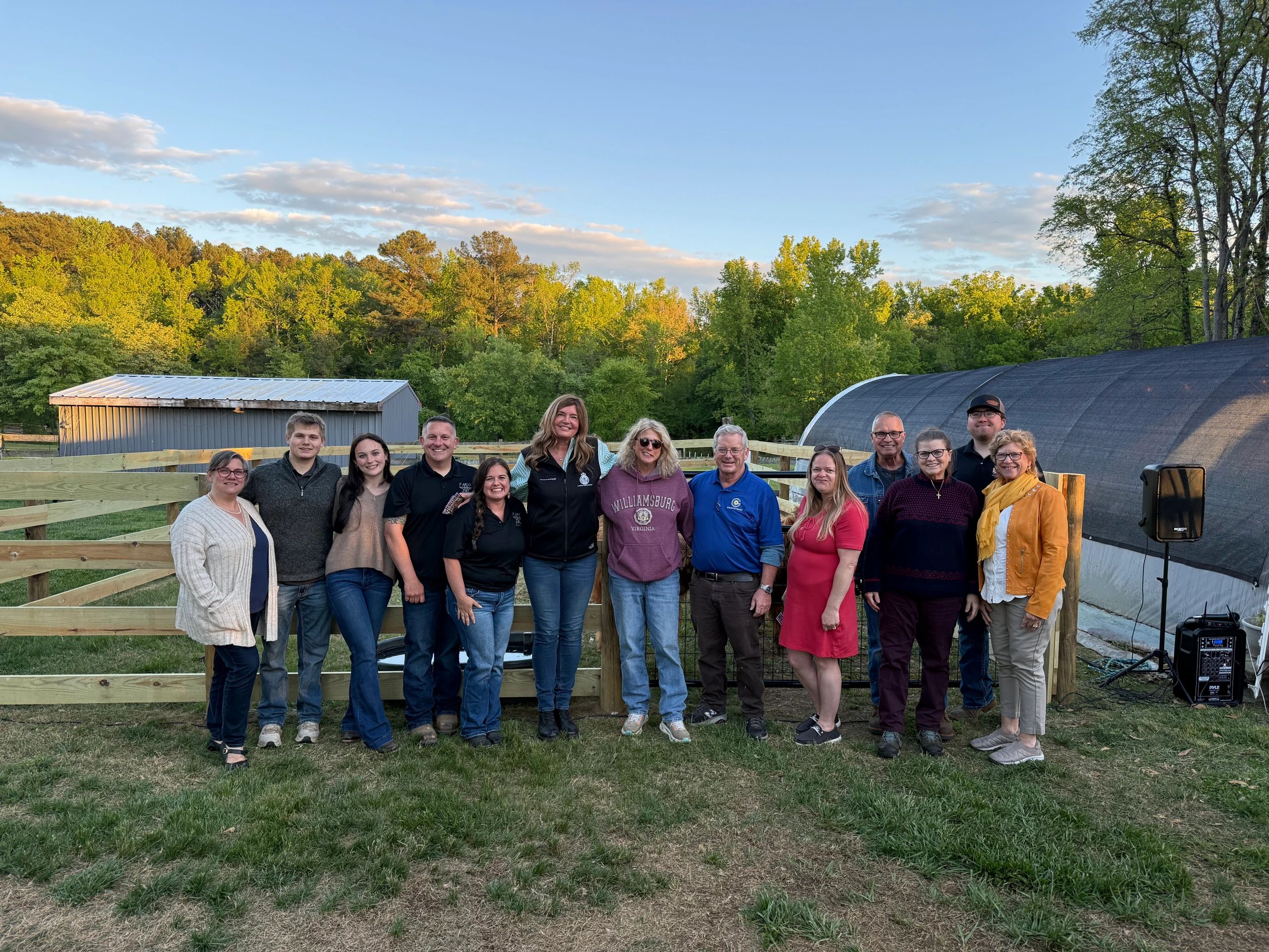 Amy with a group of neighbors outdoors